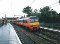 320 322 with an Aidrie service at Easterhouse in July 1997. <br><br>[David Panton /07/1997]