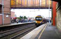 The 1351 Motherwell - Manchester FTPE service waits to depart from platform 1 at Motherwell on 2 January 2008.<br><br>[John McIntyre 02/01/2008]