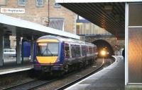 Light at the end of the tunnel...view east along platform 2 at Haymarket as Fife Circle trains are about to cross on 8 January 2008.<br><br>[John Furnevel 08/01/2008]