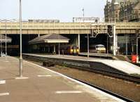 West end of Waverley in July 1991 with an SPT liveried 156 alongside an InterCity class 91 at the platforms.<br><br>[John McIntyre 06/07/1991]