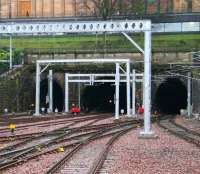 Looking west towards The Mound tunnels on 8 January 2008 with new masts in place for remaining electrification work. <br><br>[John Furnevel 08/01/2008]