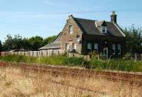 The former station at Forteviot in August 2007 seen looking southwest from the level crossing.<br><br>[David Panton 22/08/2007]