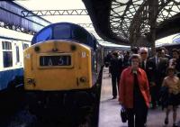 Passengers leaving platform 3 at Aberdeen in July 1974 following the arrival of a train from the south behind a class 40 locomotive.<br><br>[John McIntyre /07/1974]