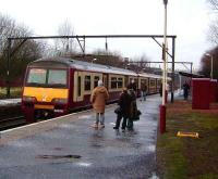 320 310 at Barnhill with a Springburn - Dalmuir train on 12 January 2008. <br><br>[David Panton 12/01/2008]