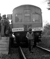 <I>Where did I leave that red flag?</I> The <I>Buchan Belle</I> DMU railtour stopped at Udny on 01 June 1974.<br><br>[John McIntyre 01/06/1974]
