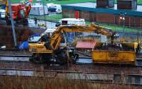 Rail crane helping to clear the mud just west of the twin Dalreoch Tunnels. Note the boards on the track. Although the line is closed to electric trains the evening Sleeper ran (very slowly) south and morning freight ran north before the line was re-occupied.<br><br>[Ewan Crawford 18/01/2007]