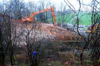 Digger preparing the embankment for stablisation just west of the twin Dalreoch Tunnels.<br><br>[Ewan Crawford 18/01/2007]