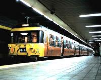 303 011 stands at Glasgow Central Low Level station in August 1985 with a Lanark service.<br><br>[David Panton /08/1985]