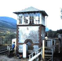 Passing the old signal box at Glen Douglas on the West Highland line in October 1987.<br><br>[David Panton /10/1987]
