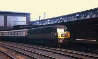 One of the ubiquitous (at that time) Brush Type 4 (subsequently class 47) mainline diesels about to leave Carlisle with a southbound service on 13 June 1968. A total of 512 of these highly successful and versatile locomotives appeared between 1962 and 1968 with production being split between BR Crewe works and the Brush Traction plant in Loughborough.<br><br>[John McIntyre 13/06/1968]