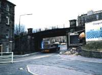Trinity Bridge, of <I>tram pinch</I> fame looking south up Trinity Road. The photograph was taken in May 1986 at which time track was still in place but the branch had been disused for around two years. The former Trinity station, now a private house, still stands a short distance along the trackbed up on the left and Granton Harbour is half a mile further west along Lower Granton Road.  <br><br>[David Panton /05/1986]