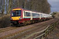 Strathclyde liveried 170 476 passes the site of the bridge over the Fordell Railway east of Dalgety Bay station on 30 January.<br><br>[Bill Roberton 30/01/2008]