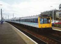 117s from Haymarket depot run ECS through Haymarket station in April 1995 on their way to Waverley to provide reinforcements for the evening peak. <br><br>[David Panton /04/1995]