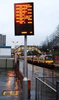 <i>Swish new</i> destination board at Dalmuir. A pity the same cannot be said for the passenger and staff accommodation at this busy junction station. Yoker route train in the platform.<br><br>[Ewan Crawford 02/02/2008]