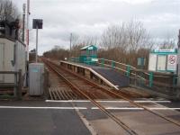 View south from Tygwyn level crossing towards Harlech, the destination of much of the school traffic that keeps these tiny Cambrian Coast stations open. Tygwyn Halt was opened in 1927 and serves a couple of small settlements nearby. <br><br>[Mark Bartlett 03/02/2008]