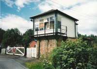 The signal box at Holywood, north of Dumfries, in 1998 looking west over the level crossing.<br><br>[David Panton //1998]