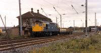 A 26 hauled PW train at Shettleston. The box, closed as part of the Yoker re-signalling scheme, controlled Shettleston Yard and the junction with the former line to Hamilton NB. View looks west towards the station.<br><br>[Ewan Crawford //1988]