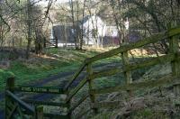 Standing at the entrance to the drive and looking east towards the converted former Waverley Line station building at Stobs on 6 February 2008. The old station stood just to the south of Stobs viaduct.<br><br>[John Furnevel 06/02/2008]