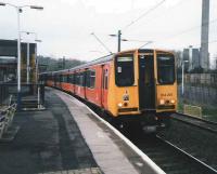 314 210 arrives at Hyndland in April 1998 on a service to Coatbridge Central.<br><br>[David Panton /04/1998]