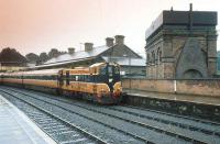 CIE 124 with a train at Drogheda on a wet day in 1993.<br><br>[Bill Roberton //1993]