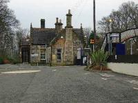 Pitlochry station forecourt in February 2008 with the new digital display revealing that the next train south is the 11:03 to Glasgow Queen Street.<br><br>[John Gray 11/02/2008]