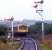 Southbound 101 DMU approaching Girvan, seen from the former goods branch. Undated.<br><br>[Ian Dinmore //]