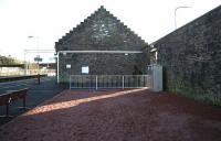 The remains of the trainshed that once formed the eastern terminus of the Dumfries, Lochmaben and Lockerbie Railway at the northwest corner of Lockerbie station on 6 February 2008. The line lost its passenger service in 1952 and closed completely in 1966. The bay was infilled and the roof removed in the early 1970s [see image 2704]. The WCML platforms stand on the left.<br><br>[John Furnevel 06/02/2008]