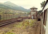 Glen Douglas crossing, box and MOD branch viewed from a northbound train. The small wooden platforms were for tablet collection. The space between the lines was once occupied by the stations island platform. There were other boxes of this style at Gorton and Corrour.<br><br>[Ewan Crawford //1988]