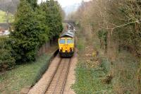 Freightliner 66523 coasts past the closed station of Clifton Bridge towards Bristol on 15 February with a loaded coal train on the Portishead branch (reopened for freight traffic in 2001). <br><br>[Peter Todd 15/02/2008]