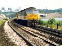 Aberdeen - Glasgow 47 hauled train approaching Invergowrie in 1989.<br><br>[Ewan Crawford //1989]