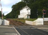 Platform remains and the creepy old signal box at Murthly in July 2007 looking northwest from the level crossing. <br><br>[John Furnevel 12/07/2007]