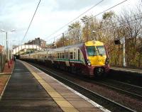 A 6-car 334 service for Ayr stands at Johnstone on 10 November 2007.<br><br>[David Panton 10/11/2007]