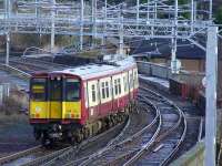 314212 crossing Wallneuk Junction as it departs Paisley Gilmour Street for Glasgow Central on 22nd February 2008.<br><br>[Graham Morgan 22/02/2008]