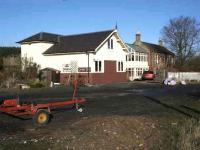 The station frontage at Hassendean on 6 February 2008, looking north towards St Boswells from the south east corner of the old station yard.<br><br>[John Furnevel 06/02/2008]