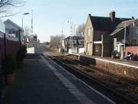 Scene at Bare Lane station in February 2008 looking past the signal box and over the level crossing towards Morecambe.<br><br>[Mark Bartlett 12/02/2008]