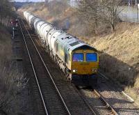 Scene just south of Laurencekirk on 27 February with Freightliner 66615 on the 6A65 Oxwellmains - Aberdeen cement train.<br><br>[Bill Roberton 27/02/2008]