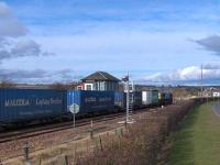 Asda Intermodal passing through Montrose at speed heading for Aberdeen behind a DRS Class 66.<br><br>[Brian Forbes 02/03/2008]