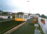 The few passengers of 117 301 (including me) detrained at Kinghorn because of a smoke leak after a grinding journey from Kirkcaldy. September 1998.<br><br>[David Panton /09/1998]