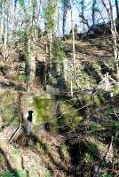 Looking up to the culvert passing under the military railway and the JCB working on the old line to repair the West Highland Railway.<br><br>[Ewan Crawford 04/03/2008]