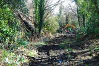 Temporary stairway up onto the West Highland (left) from the old Faslane branch. View looks to Faslane Junction<br><br>[Ewan Crawford 04/03/2008]