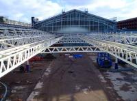 Looking into the northeast corner of the station from Guild Street Bridge on 5 March. Work is underway on the next phase of the station refurbishment with car parking here currently suspended. The outline of the infilled former <I>Great North</I> bay platforms 10&11 can be clearly seen and the remaining canopy framework, which had been badly affected by rust, has been given a coat of paint.   <br><br>[Andy Furnevel 05/03/2008]