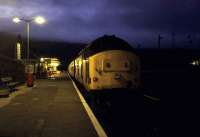 37 197 stands at the head of a train stabled for the night under a stormy sky at Kyle of Lochalsh one evening in 1987.<br><br>[Ian Dinmore //1987]