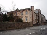 Only used for passengers from 1840 to 1849, although goods trains continued to a yard just behind this building until the 1960s. Lancaster Greaves, better known locally as Penny Street station, was replaced by Lancaster Castle station when the Carlisle extension opened. It has been an NHS building for many years and is part of the Lancaster Royal Infirmary complex. <br><br>[Mark Bartlett 13/03/2008]