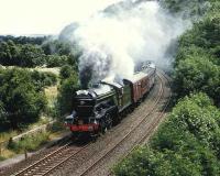 V2 4771 <I>Green Arrow</I> running wrong line near Border Counties Junction to the west of Hexham c 1985 with <I>The Citadel</I> railtour.<br><br>[Colin Alexander //1985]