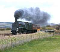 A4 60009 crossing May Water heading south with a single coach.<br><br>[Brian Forbes 14/03/2007]