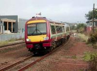 The northern approaches to Larbert seen on 25 August 2007 as 170 475 arrives with a Glasgow train.<br><br>[David Panton 25/08/2007]