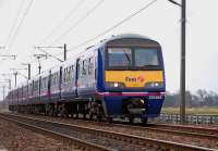 Edinburgh - North Berwick train approaching St Germains level crossing on 15 March.<br><br>[Bill Roberton 15/03/2008]