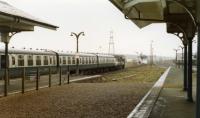 A class 27 pulls the Inverness train out of Keith en route to Aberdeen in the spring of 1981. The in-filled GNSR bay platforms can be seen in the foreground.<br><br>[John Williamson //1981]