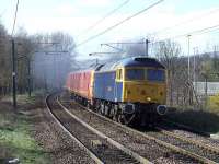 47848 producing lots of smoke as it reaches the top of the hill on the approach to Johnstone station, heading east. This was a GBRf driver training run from Shieldmuir to Ayr and back with a Royal Mail EMU attached <br><br>[Graham Morgan 16/03/2008]