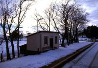 Snowy evening at Forsinard in February 1988. View along the up platform towards the crossing.<br><br>[Ian Dinmore /02/1988]